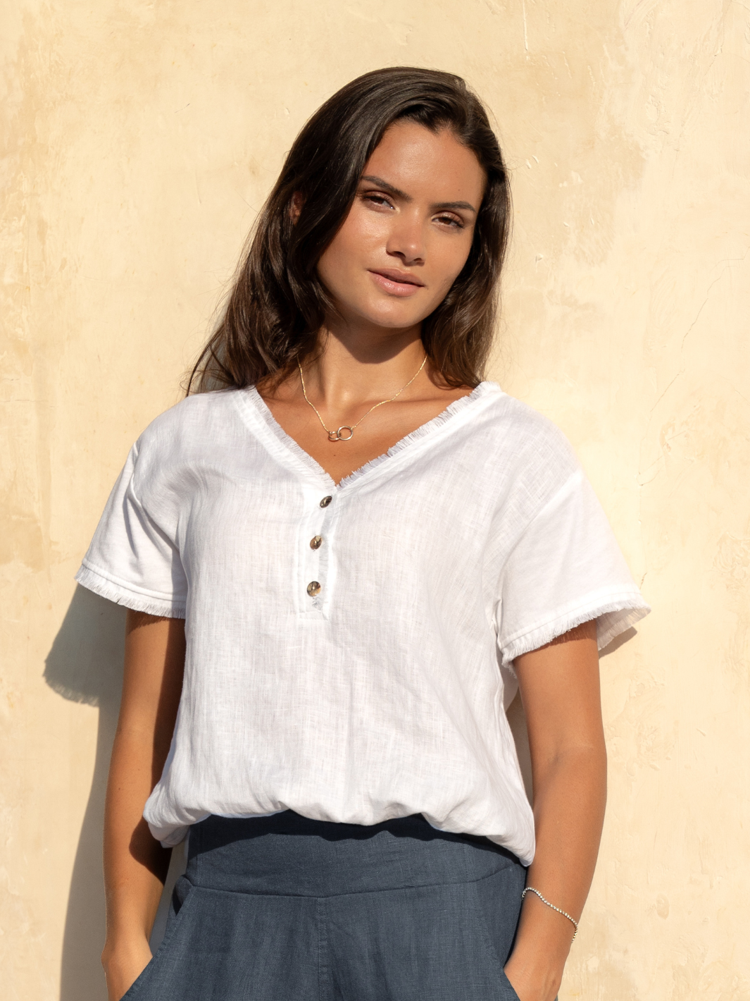 Model wears Vivre Linen and Cotton Blouse in White
