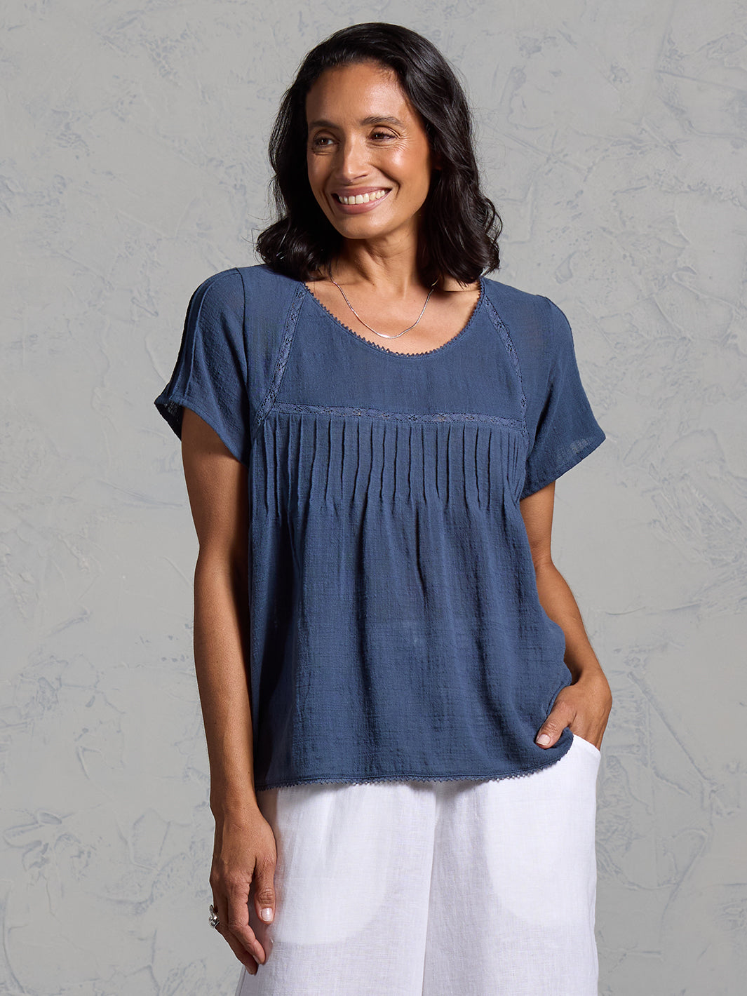 Woman wearing Biarritz Cotton Top Navy from Nomad the Label