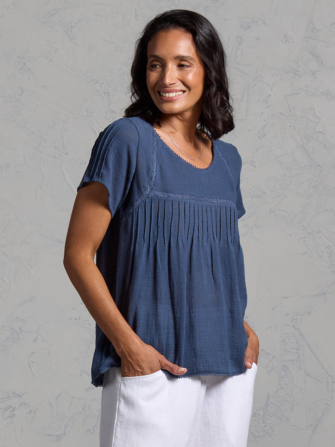 Woman wearing Biarritz Cotton Top Navy from Nomad the Label