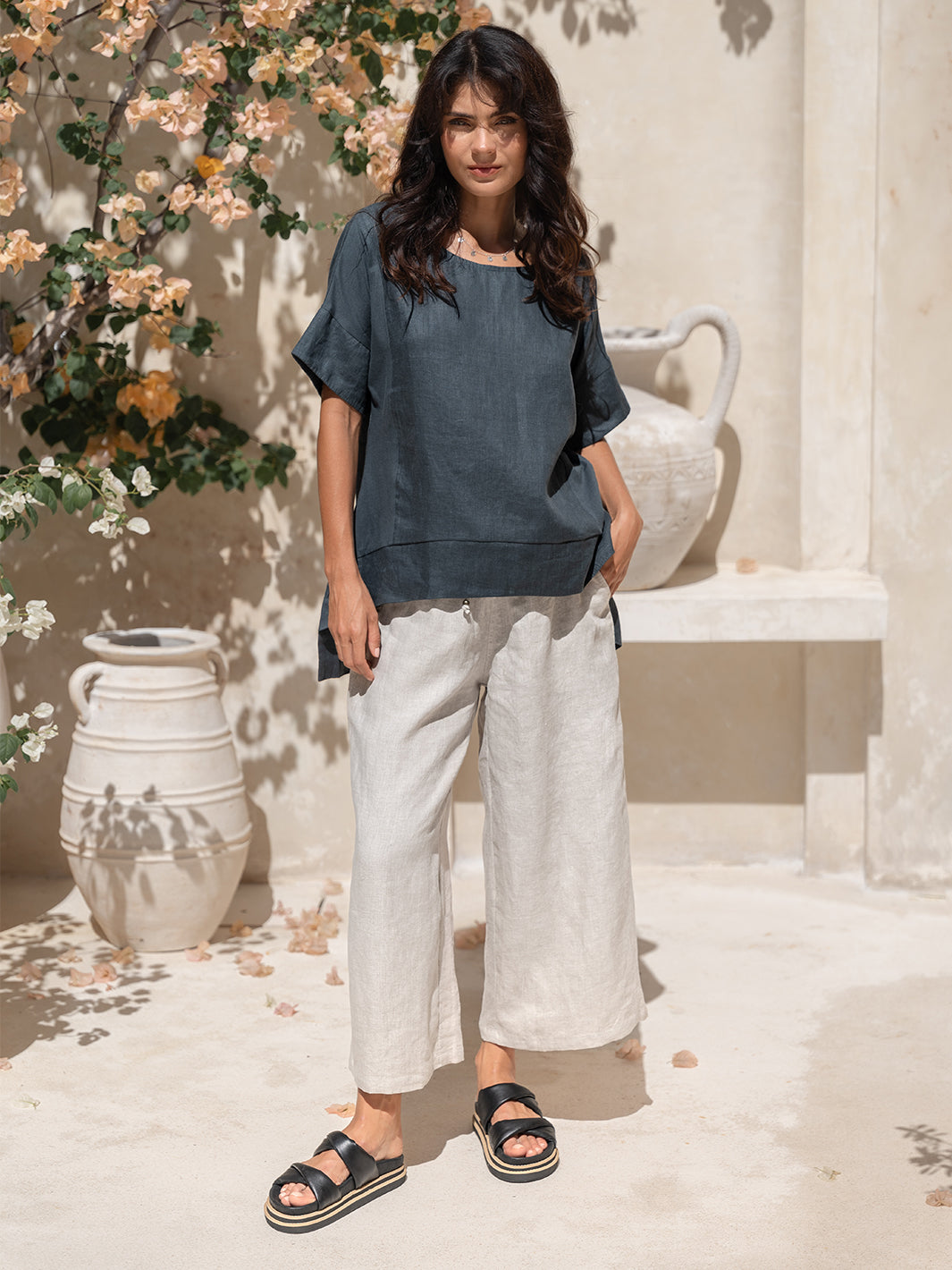 Model wears Costa French Linen and Cotton Top in Charcoal.