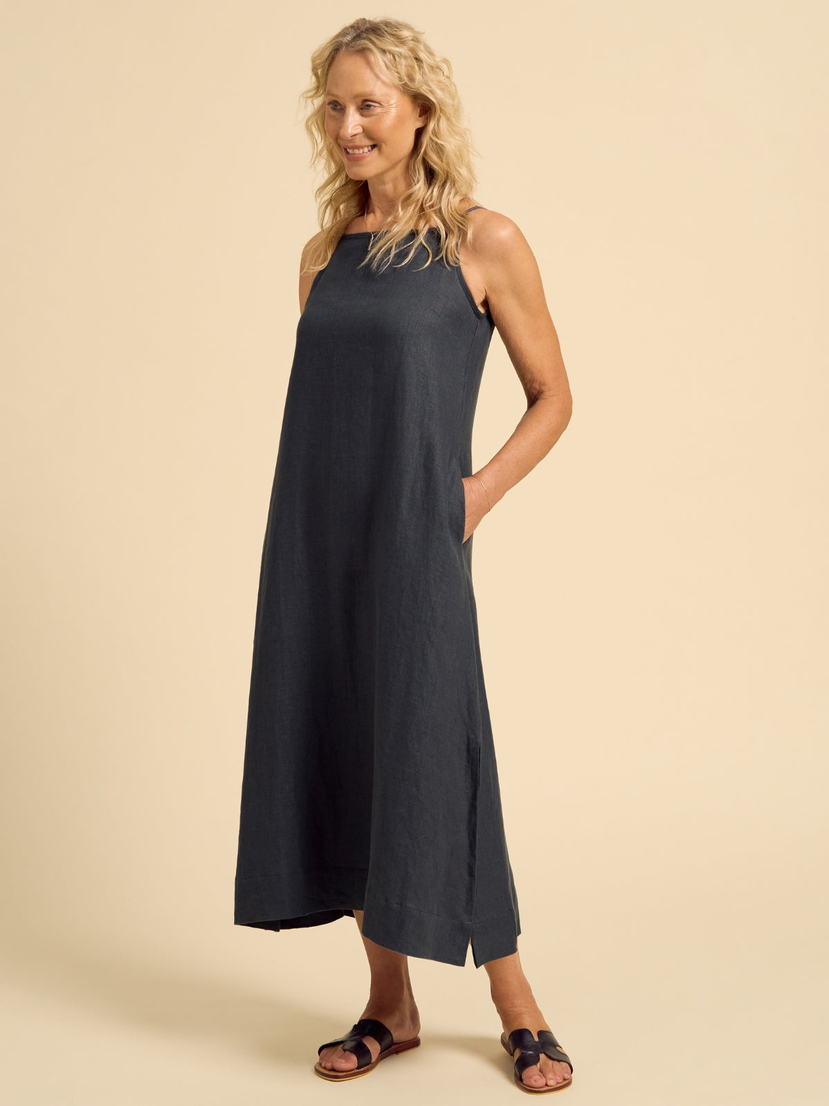 Model wears Peony Linen Dress in Charcoal