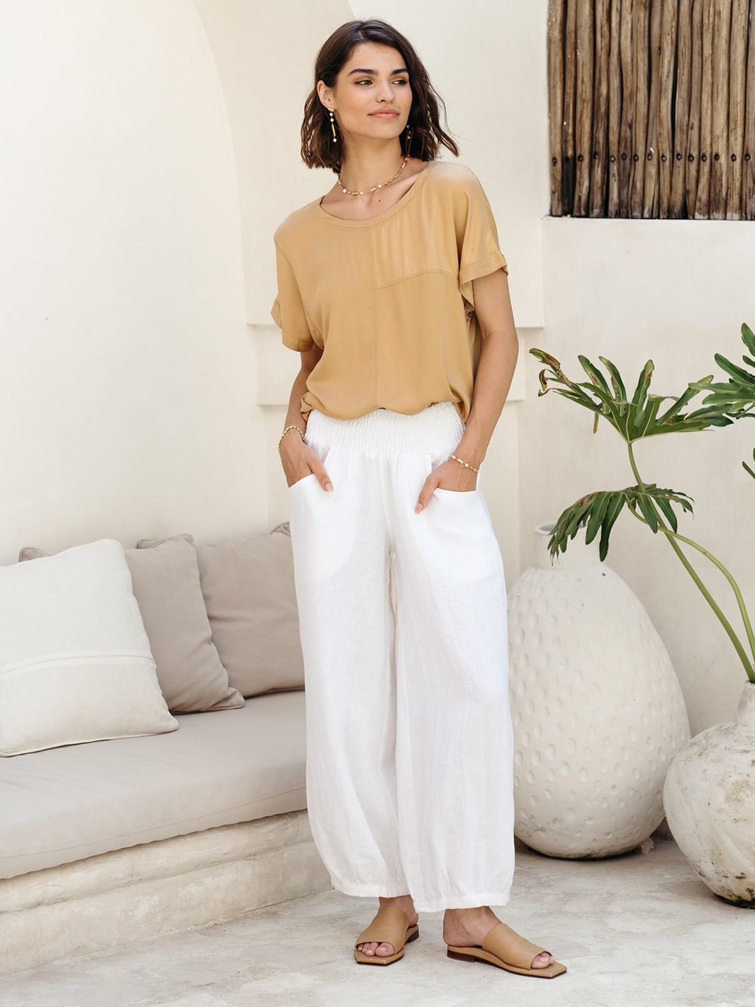 Model wears Sadhu French Linen Pants Regular in White