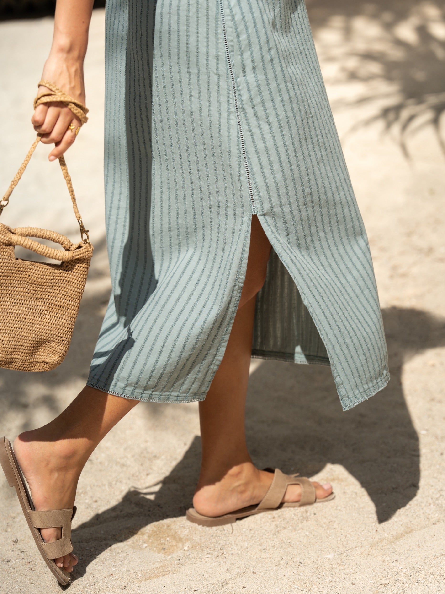 Woman wearing the Mimosa Organic Cotton Dress Marine Green from Nomad the Label