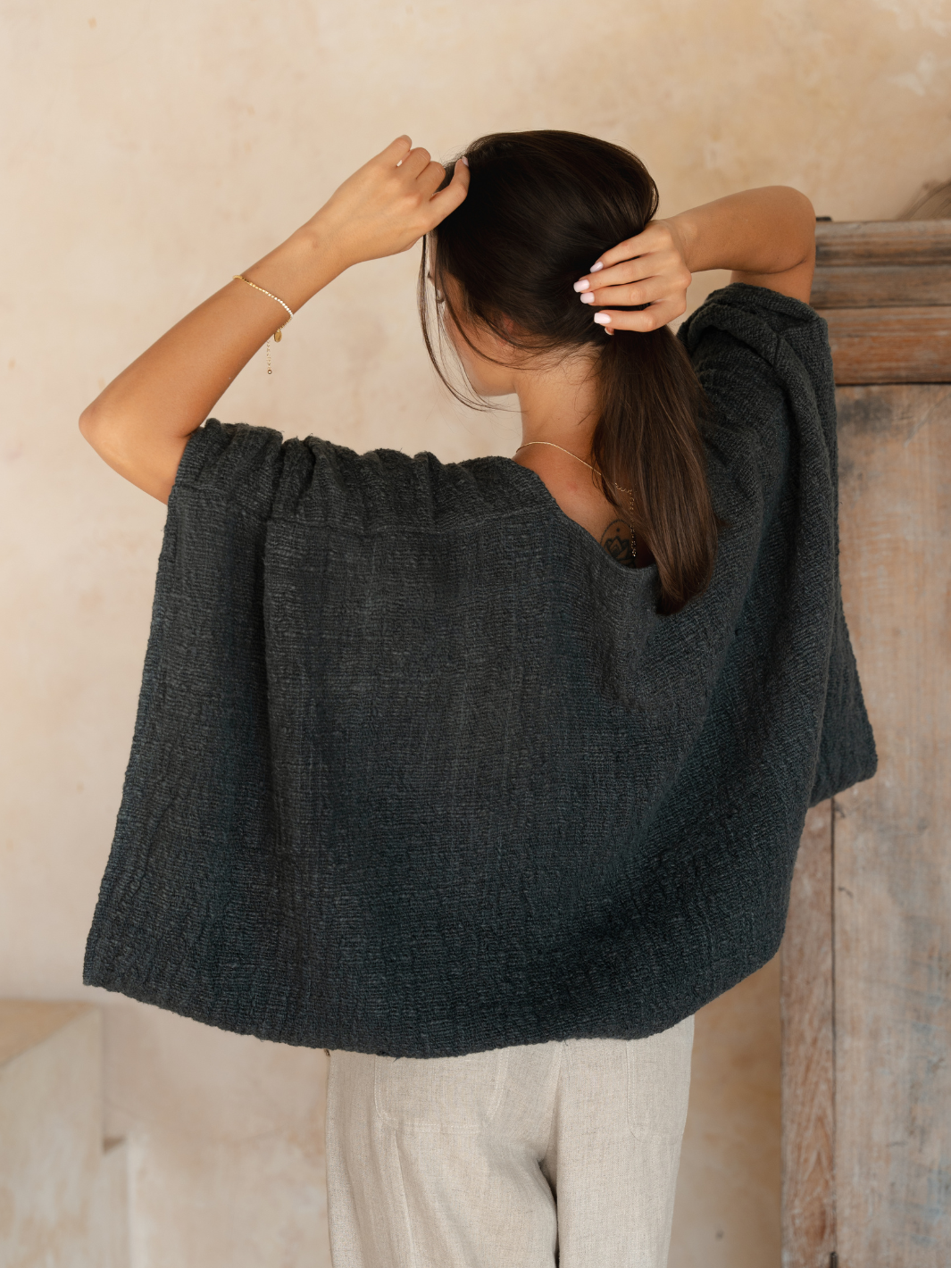Image features Bloom Cotton Shrug in Charcoal.