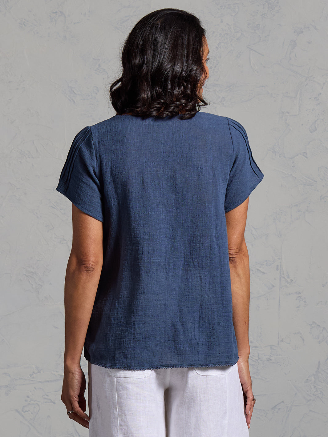 Woman wearing Biarritz Cotton Top Navy from Nomad the Label