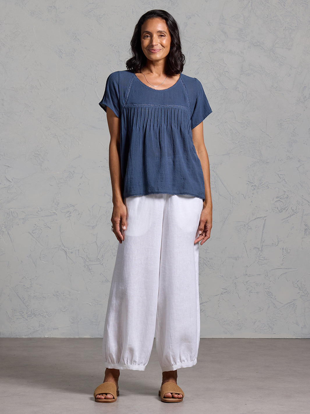 Woman wearing Biarritz Cotton Top Navy from Nomad the Label