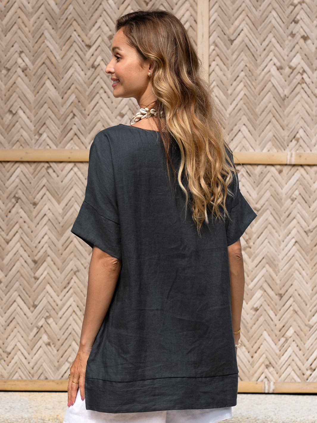 Model wears Costa French Linen and Cotton Top in Charcoal.