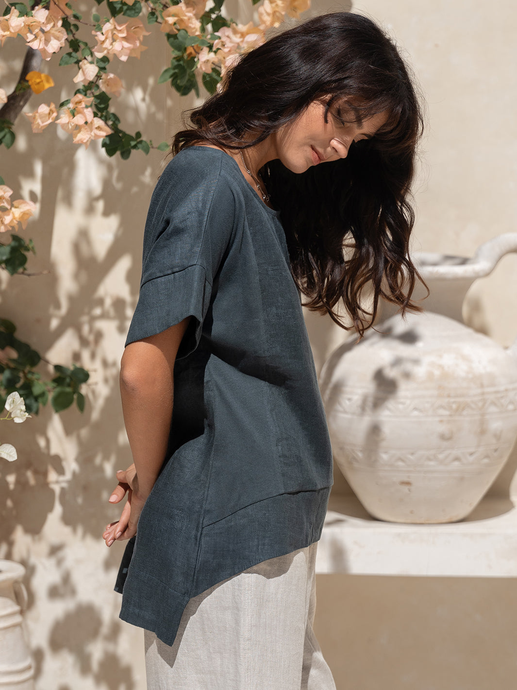 Model wears Costa French Linen and Cotton Top in Charcoal.