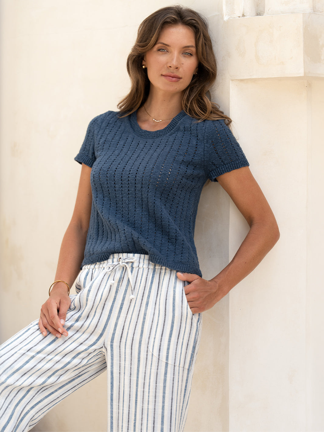 Close view of the Jolie Linen Blend Trousers in coastal blue, showing the drawstring waist and striped weave.