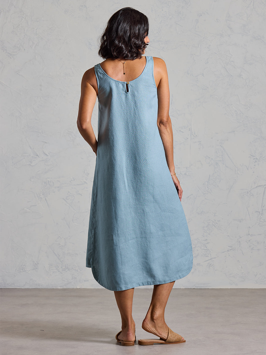 Model wearing Laurel French Linen Dress in Tahiti Blue colour