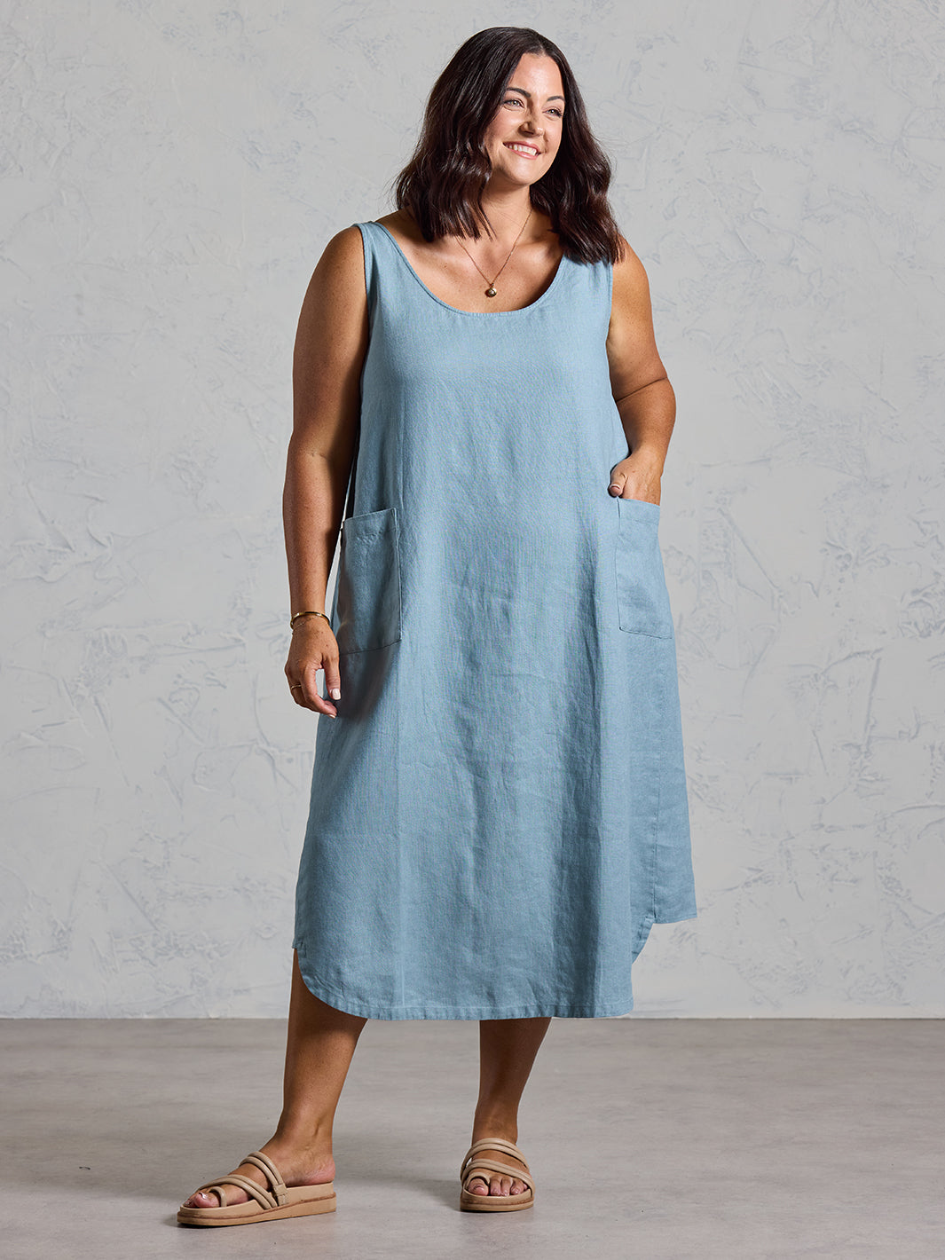Model wearing Laurel French Linen Dress in Tahiti Blue colour