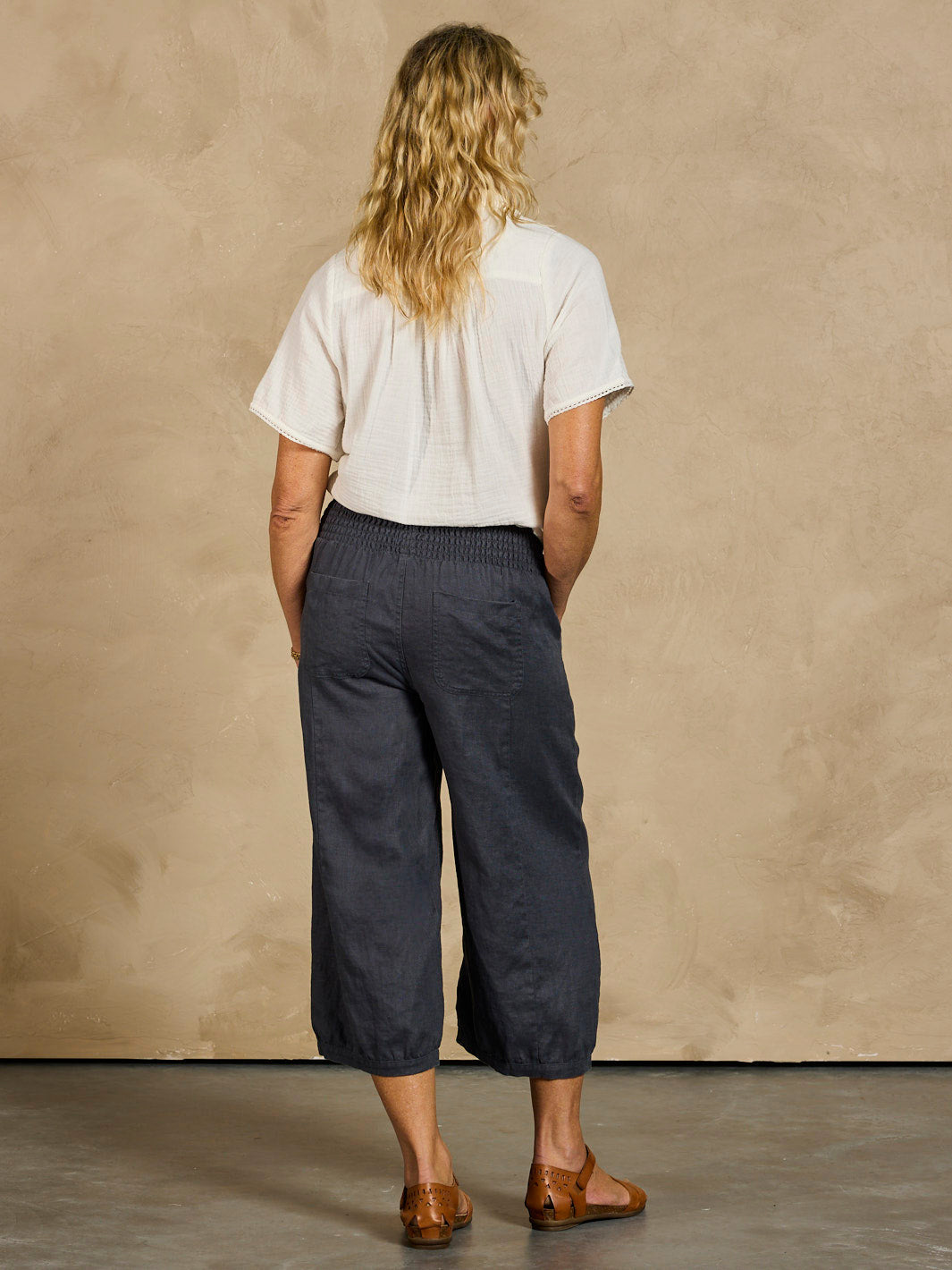 Model wearing Marrakech Linen Pants Charcoal