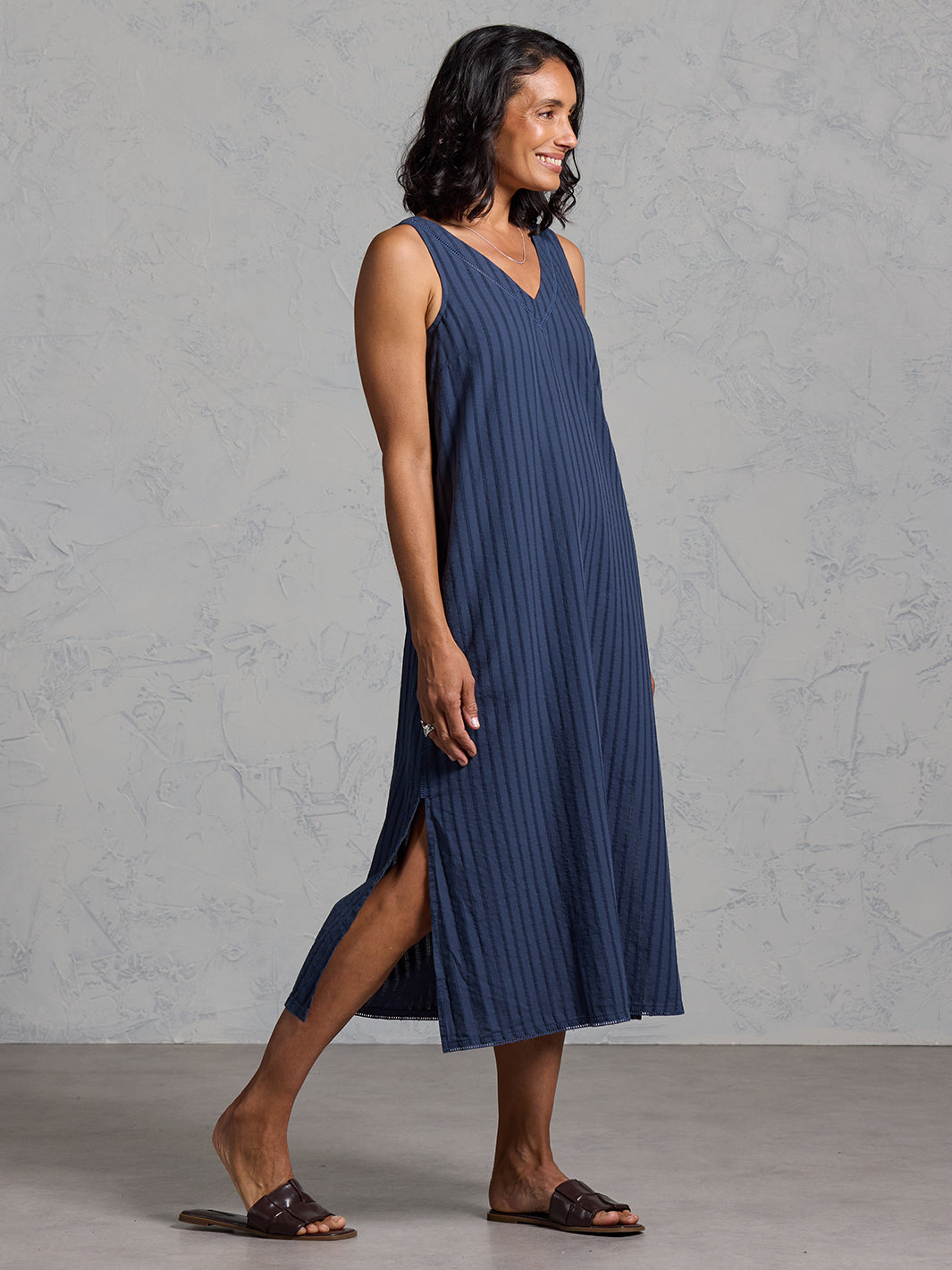 Woman wearing the Mimosa Organic Cotton Dress Navy from Nomad the Label