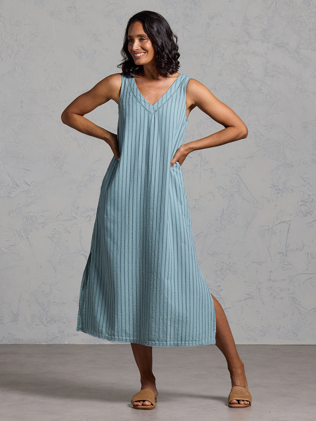 Woman wearing the Mimosa Organic Cotton Dress Marine Green from Nomad the Label