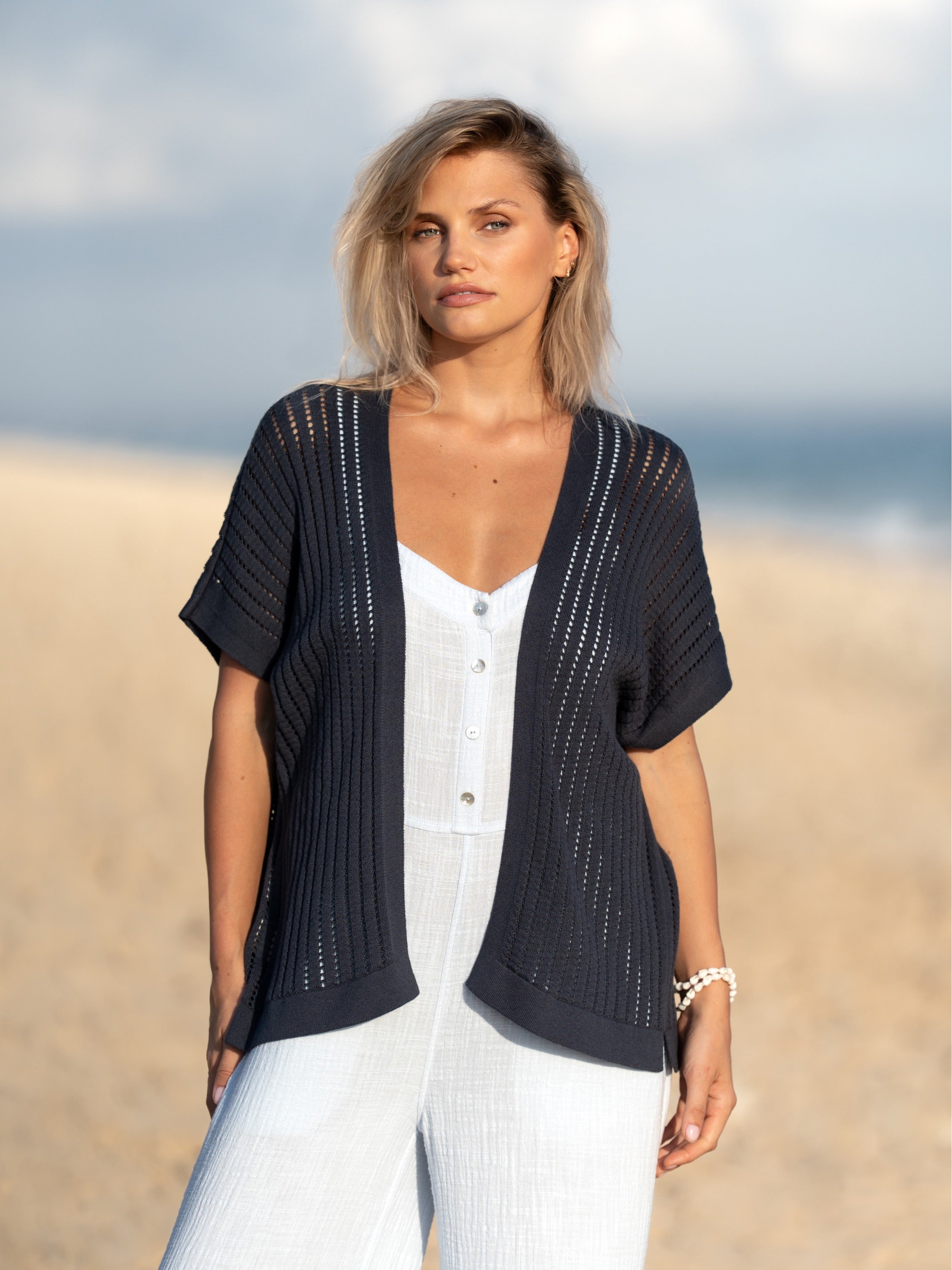 A woman wearing a charcoal cotton kimono from Nomad the Label