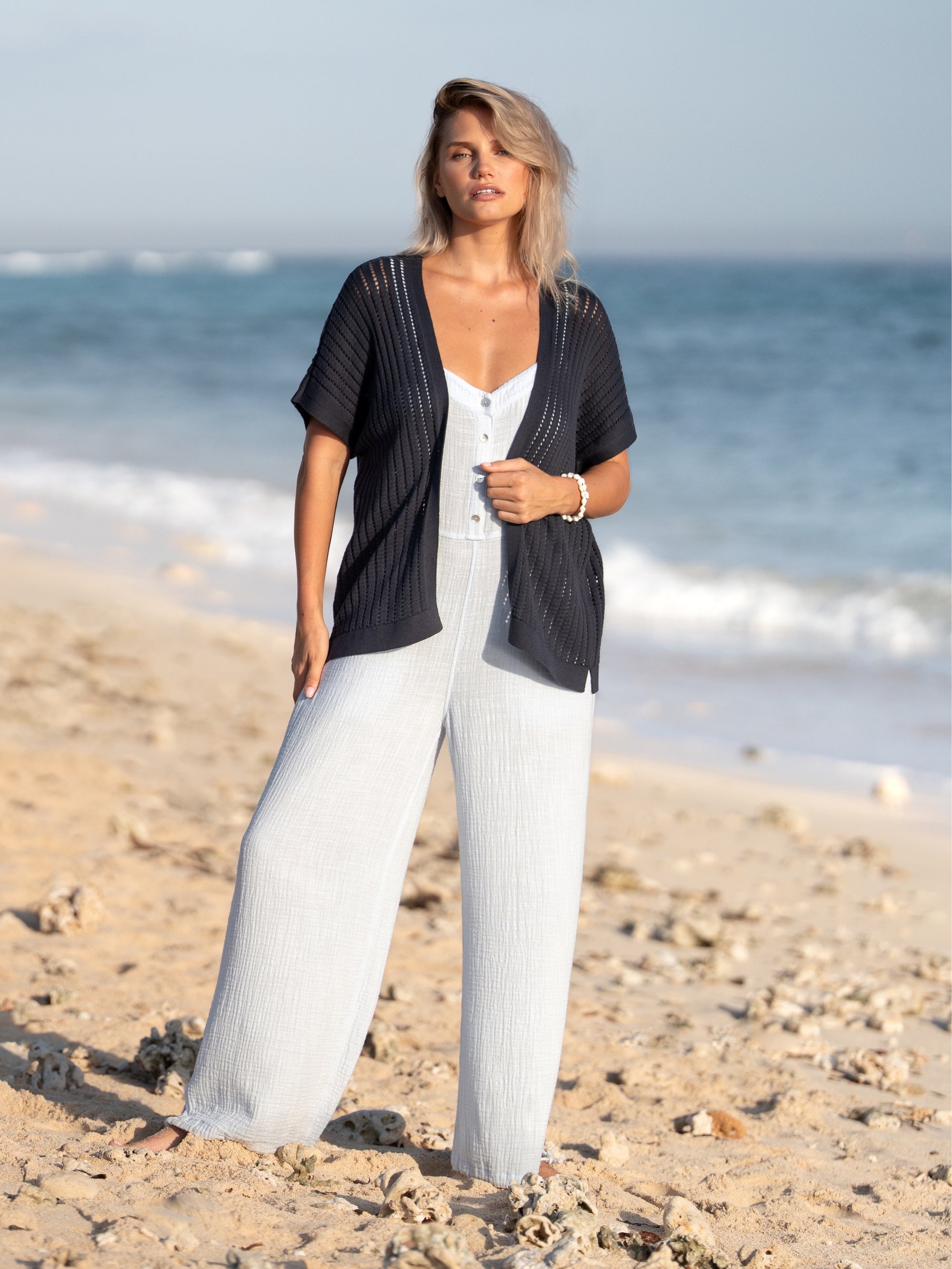 A woman wearing a charcoal cotton kimono from Nomad the Label