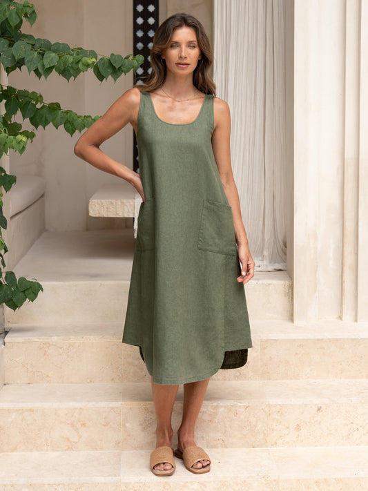 Model wearing Laurel French Linen Dress in Olive colour